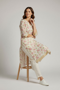 Traditional charm with floral onam kurthi handcrafted