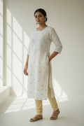Pure cotton Oman kurtha highlighted with floral embroidery work.
